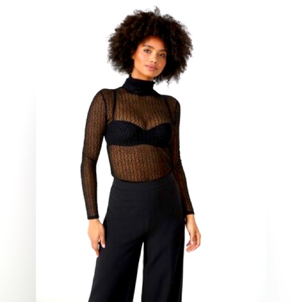 Black sheer turtleneck size XS BCBG